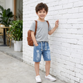 Kids' denim shorts by Fox Kids, showing a pair of stylish blue jeans shorts with pockets and a casual fit for children.