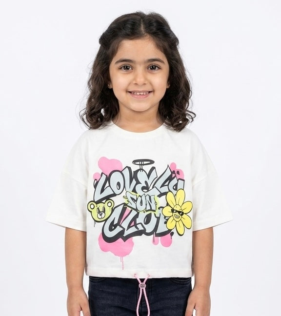 Pink girls' T-shirt by Fox Kids featuring a playful graphic design, made from comfortable, soft fabric.