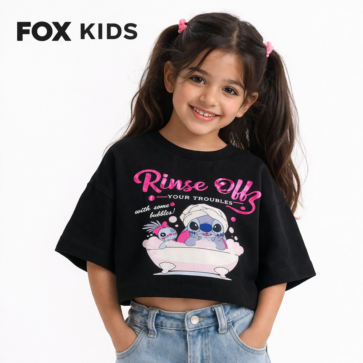 Pink girls' T-shirt by Fox Kids featuring a fun, casual design suitable for everyday wear.