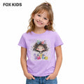 Pink girls' T-shirt from Fox Kids featuring a playful cartoon design and short sleeves, perfect for casual wear.