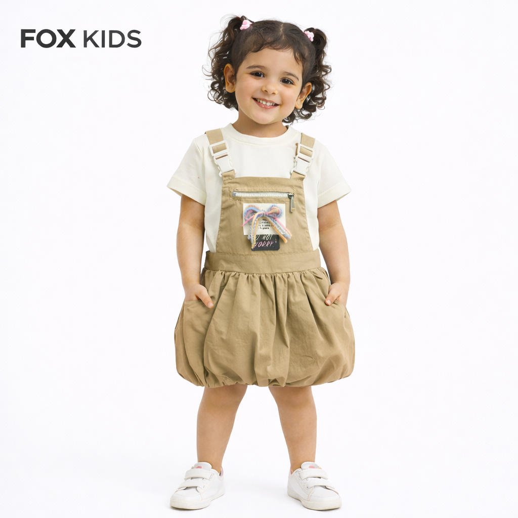 Pink girls' jumpsuit by Fox Kids featuring playful design and comfortable fabric, suitable for casual wear.