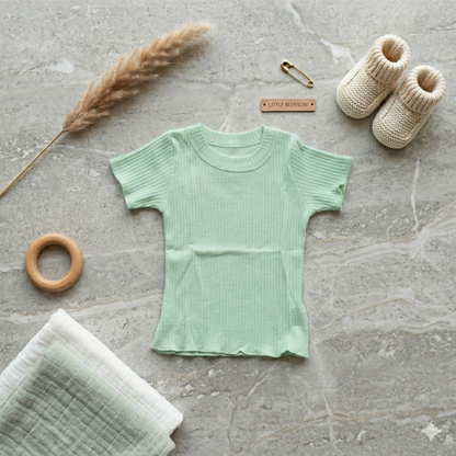 Pink girls' top by Fox Kids with short sleeves and playful design, perfect for casual wear.